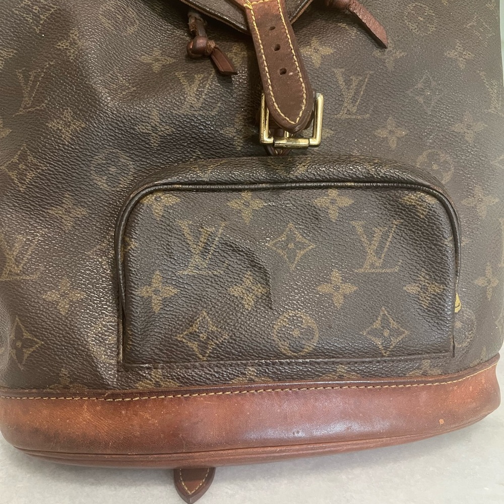 Authentic MONTSOURIS VINTAGE LEATHER BACKPACK in fair condition. See pics